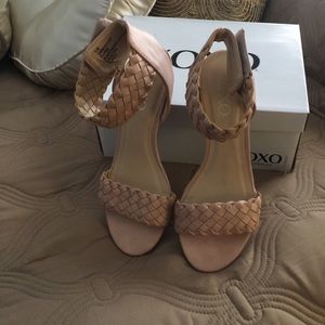 XOXO sandals with wedge heel.